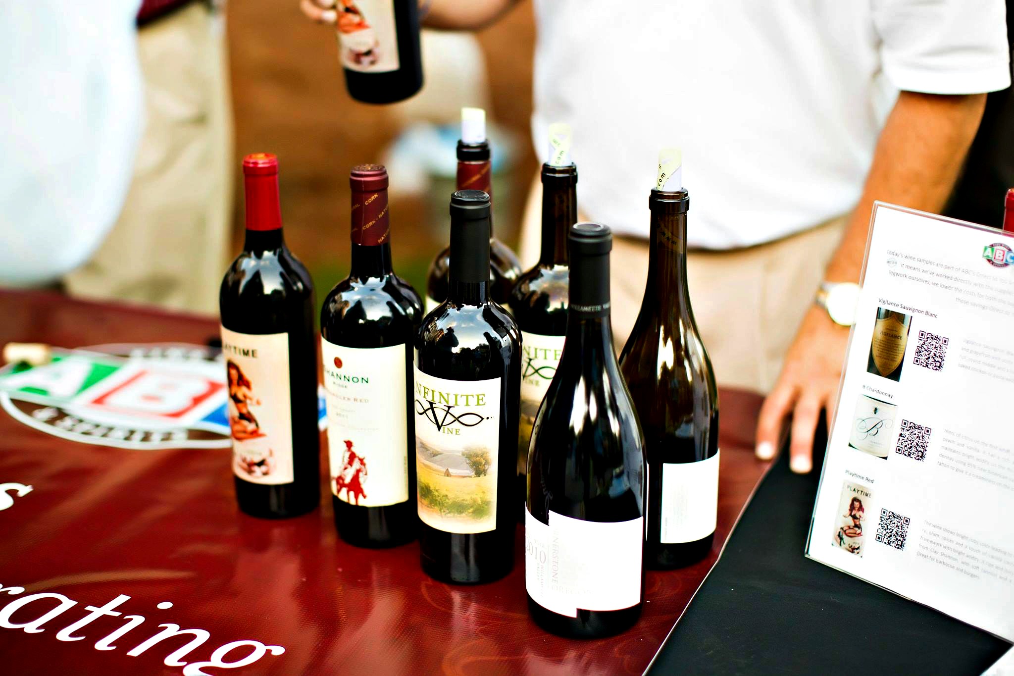 Sandestin Wine Festival sample bottles grouped on table