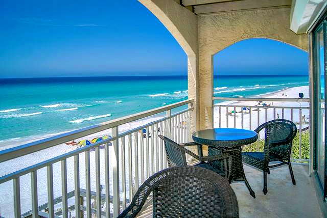 Sterling Resorts upscale balcony with wicker furniture and panoramic view of the beach and Gulf along Highway 30-A