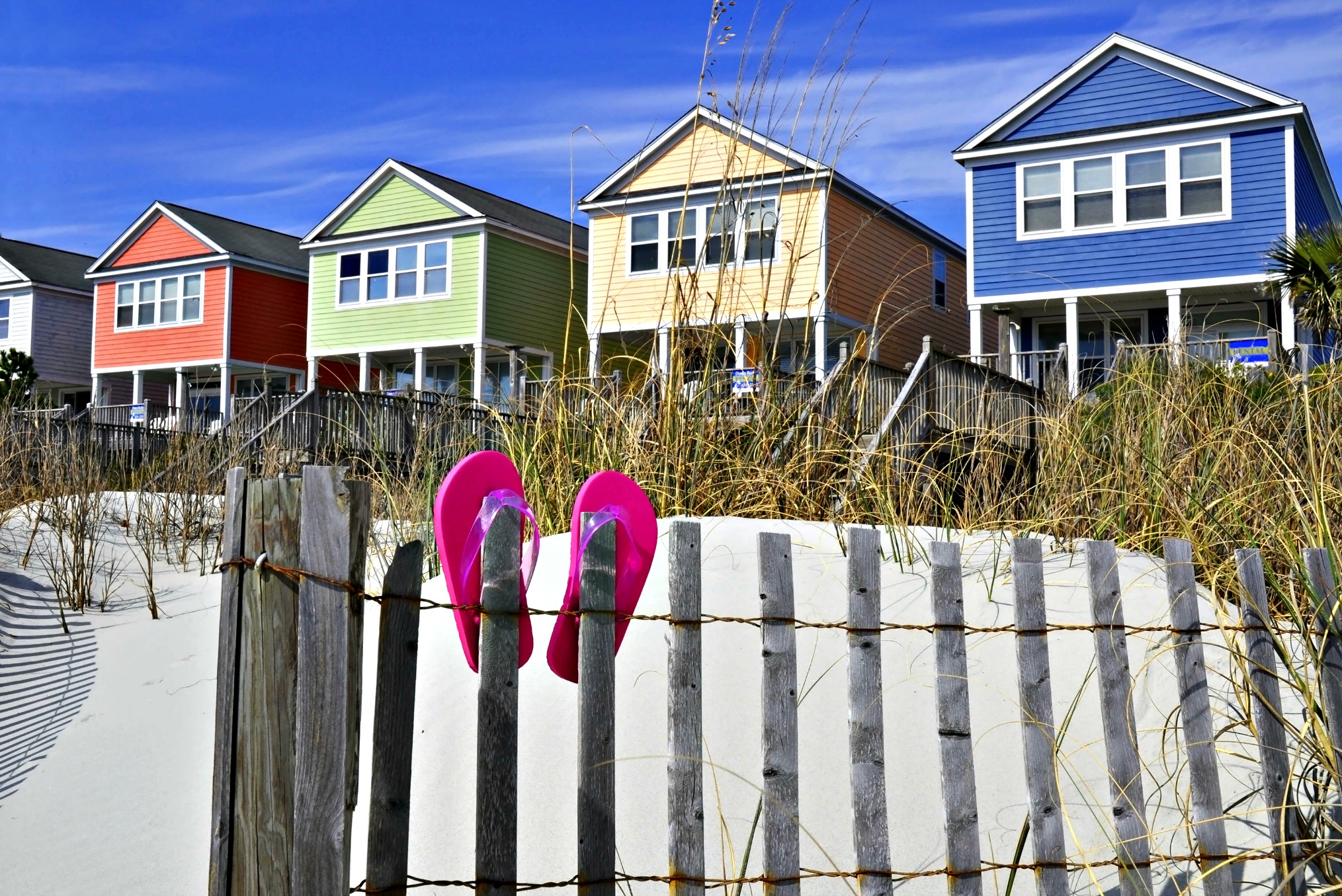 Row of colorful beach vacation rentals
