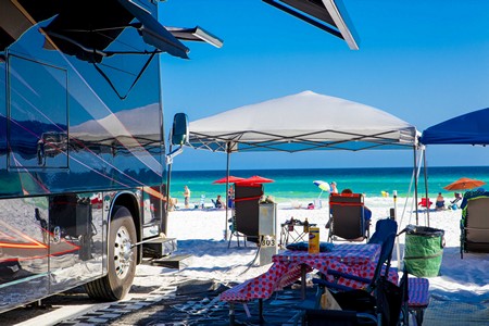 RVs can pull right up to the shore at Camp Gulf in Destin, Florida.