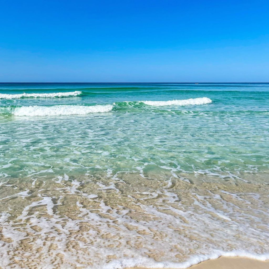 Beautiful soft white sand beach and clear turqoise water at Panama City Beach, Florida