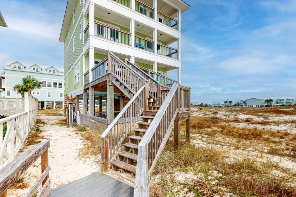 Exterior photo of Above the Dunes beach house in Fort Morgan, Alabama.