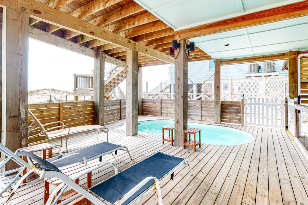 The deck with a private pool of Above the Dunes beach house in Fort Morgan, Alabama.